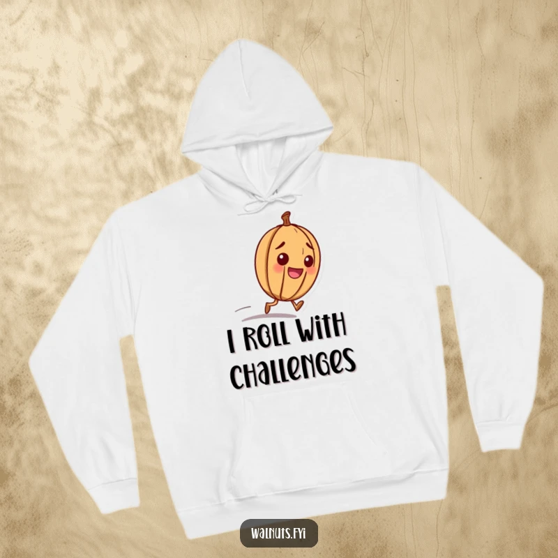 Funny hoodie with a happy walnut character with a determined look, rolling downhill with purpose.