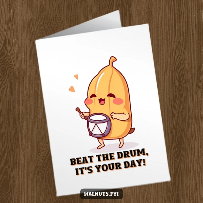 Funny Free Printable Birthday Card: Giggling pecan enthusiastically playing a tiny drum, radiating joy and rhythm.