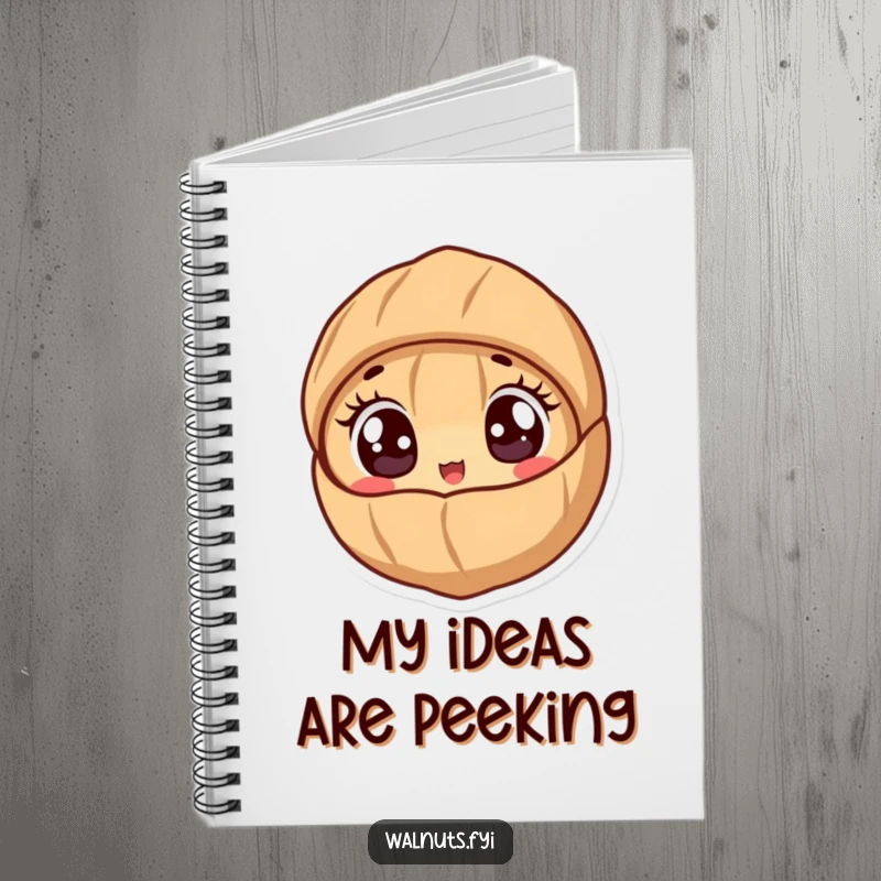 Funny notebook with a cute walnut character peeking out from its shell with wide, excited eyes.