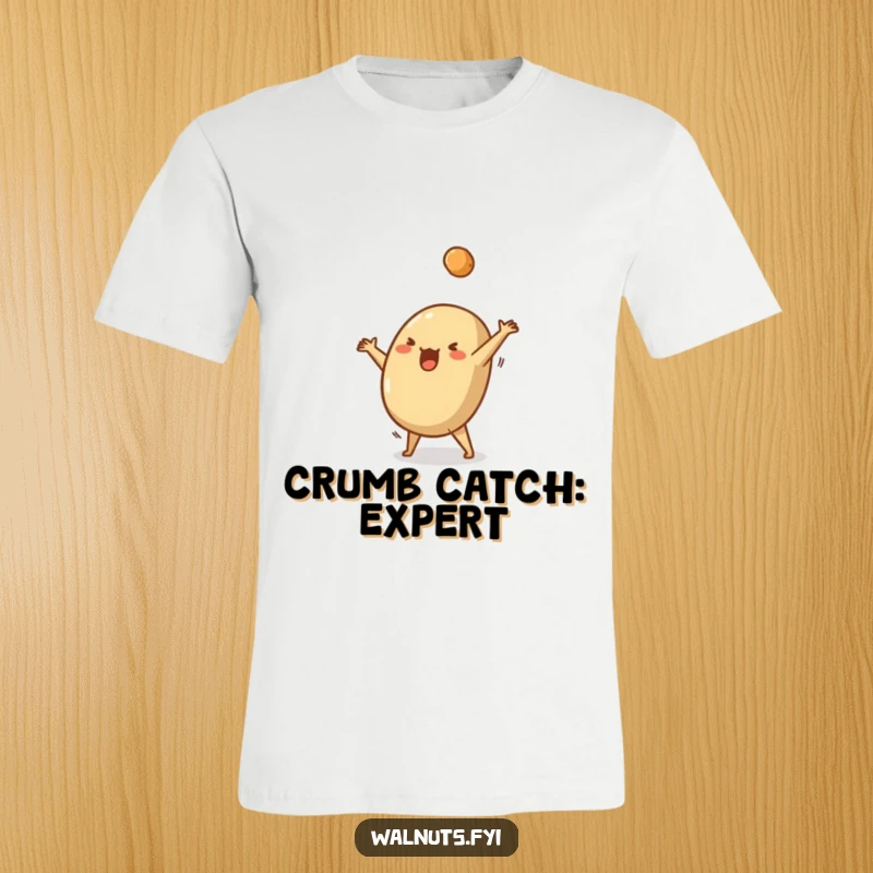 Funny t-shirt featuring a silly Brazil nut doing a cartwheel, with a crumb flying off, capturing pure joy.