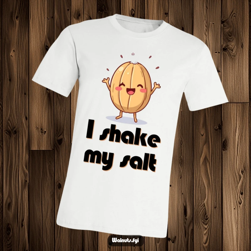 Funny t-shirt with a happy walnut performing a joyful dance, lightly dusted with salt, showcasing a hilarious nutty celebration.