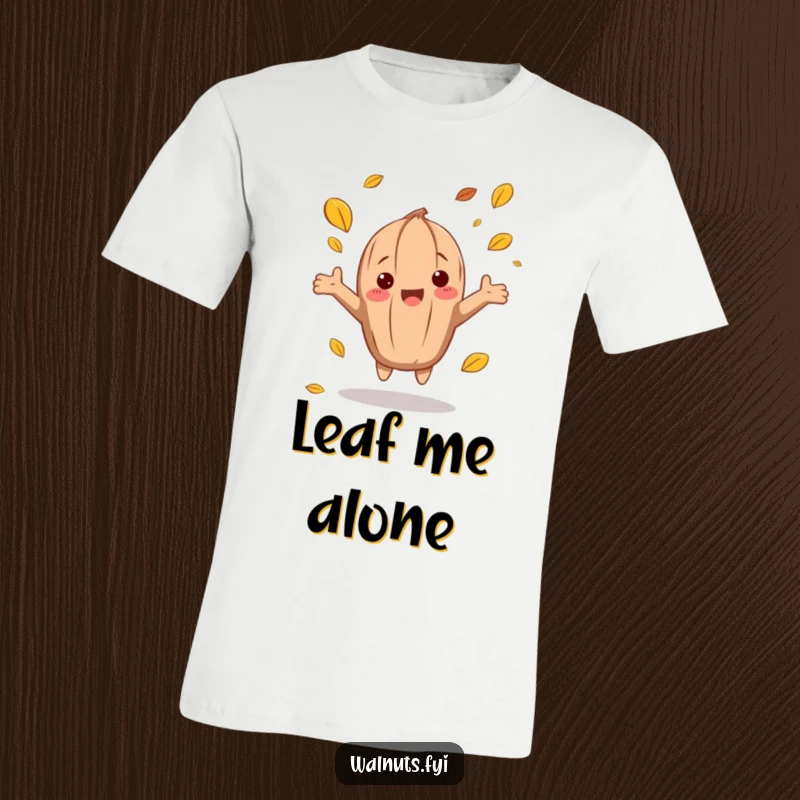 Funny autumn walnut t-shirt showing a character with arms outstretched, catching falling leaves, celebrating fall.