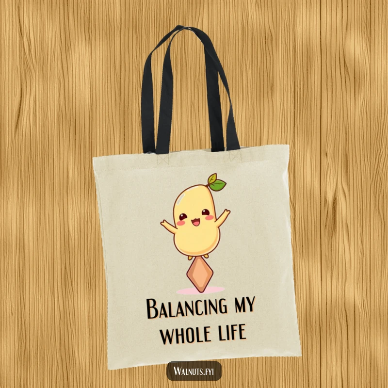 Funny tote bag featuring a determined cashew balancing on its point, designed to carry your items with nutty flair and humor.