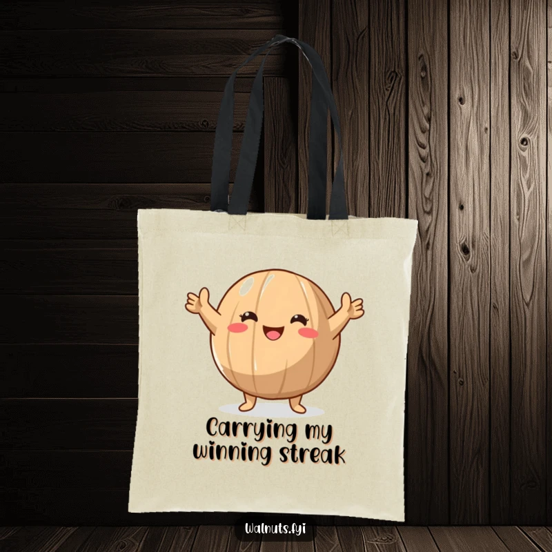 Funny Walnut Victory Tote Bag showing a round walnut character raising its arms in a triumphant, joyful gesture, perfect for carrying wins.